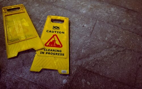 broken wet floor sign