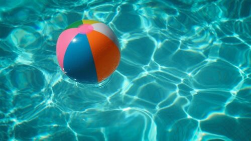 swimming pool and beach ball
