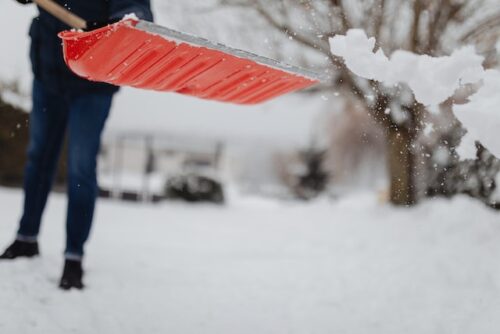 person shoveling snow