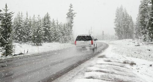 car driving in snowy conditions