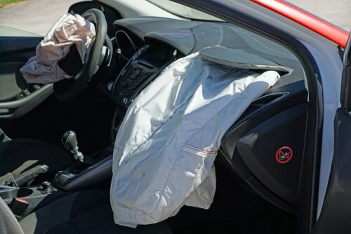 car with passenger airbag deployed
